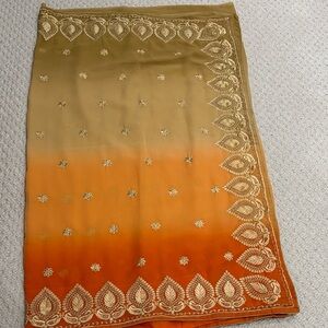 Orange and Gold shaded NEW georgette saree. Silk and gold thread embroidary.